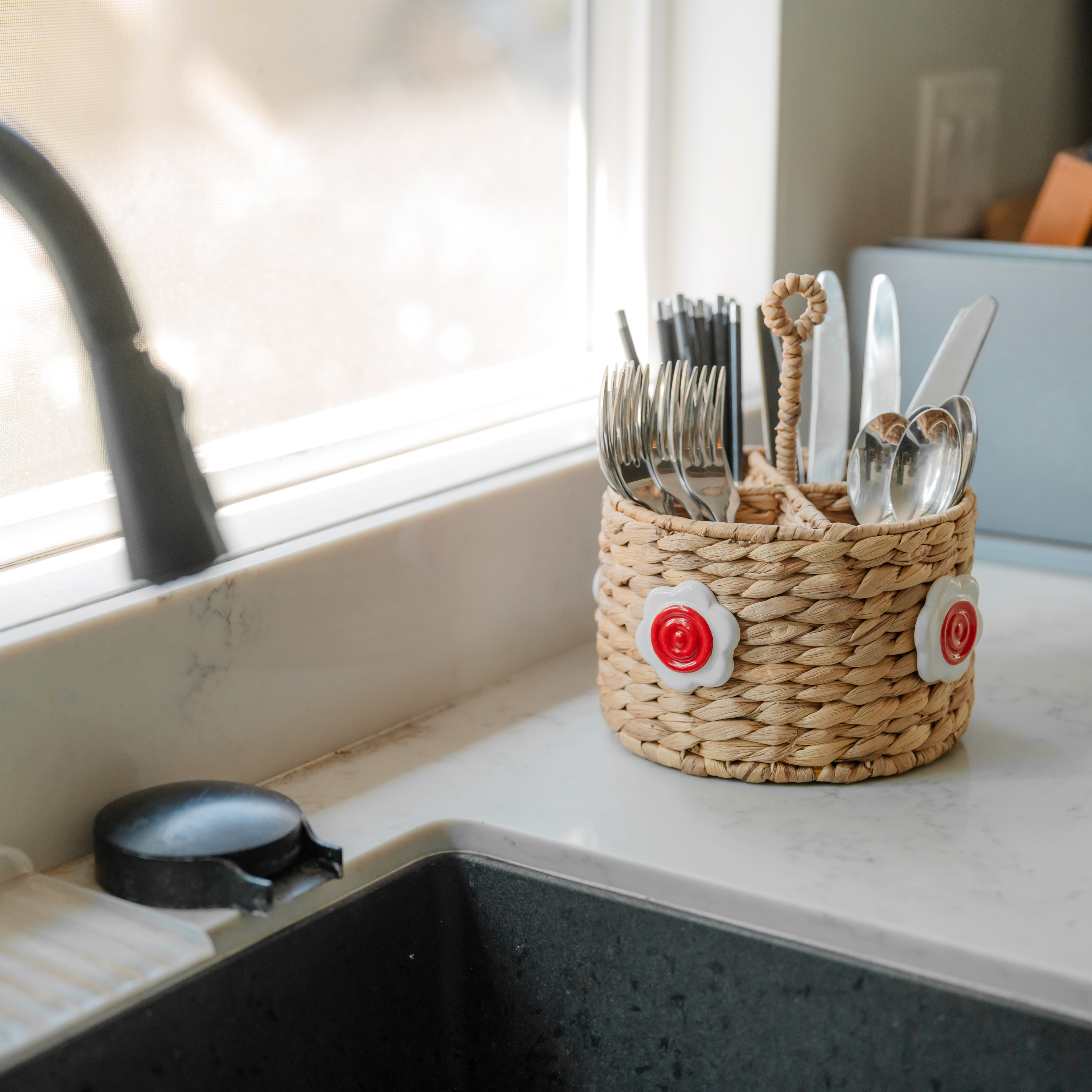 Handwoven Seagrass Utensil Holder with Red Ceramic Flower Accent
