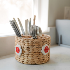 Handwoven Seagrass Utensil Holder with Red Ceramic Flower Accent